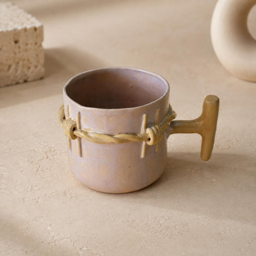 Barbed wire stoneware mug with ochre T handle by HUE Atelier