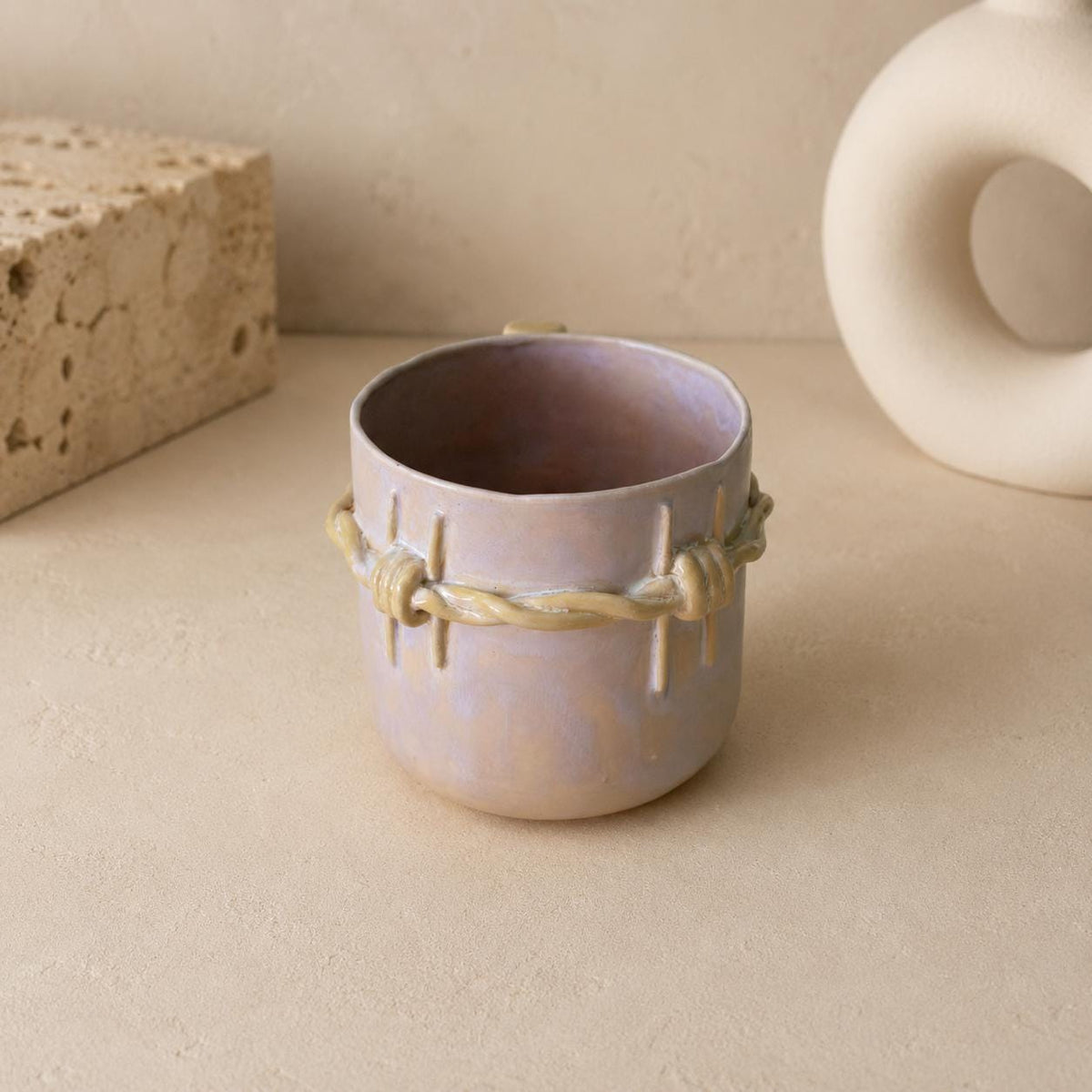 Sculptural T-shaped mug handle in ochre