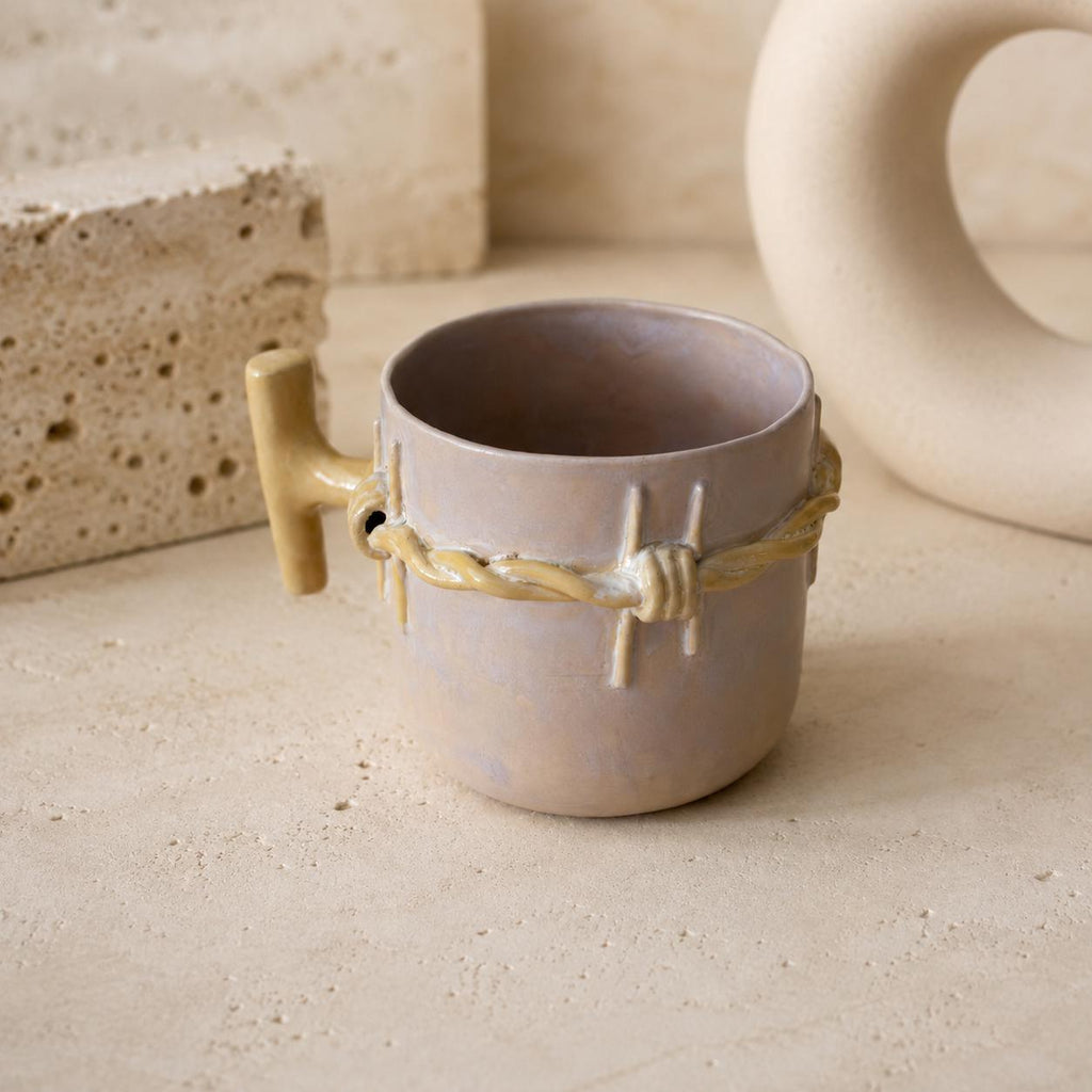 15 oz handmade stoneware coffee cup with barbed-wire design