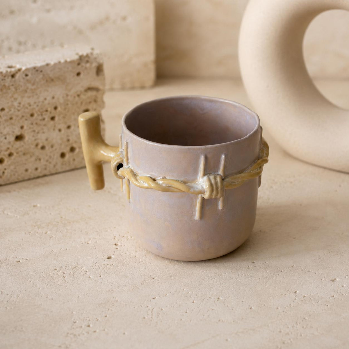 15 oz handmade stoneware coffee cup with barbed-wire design