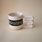 Monochrome porcelain mug for coffee and tea