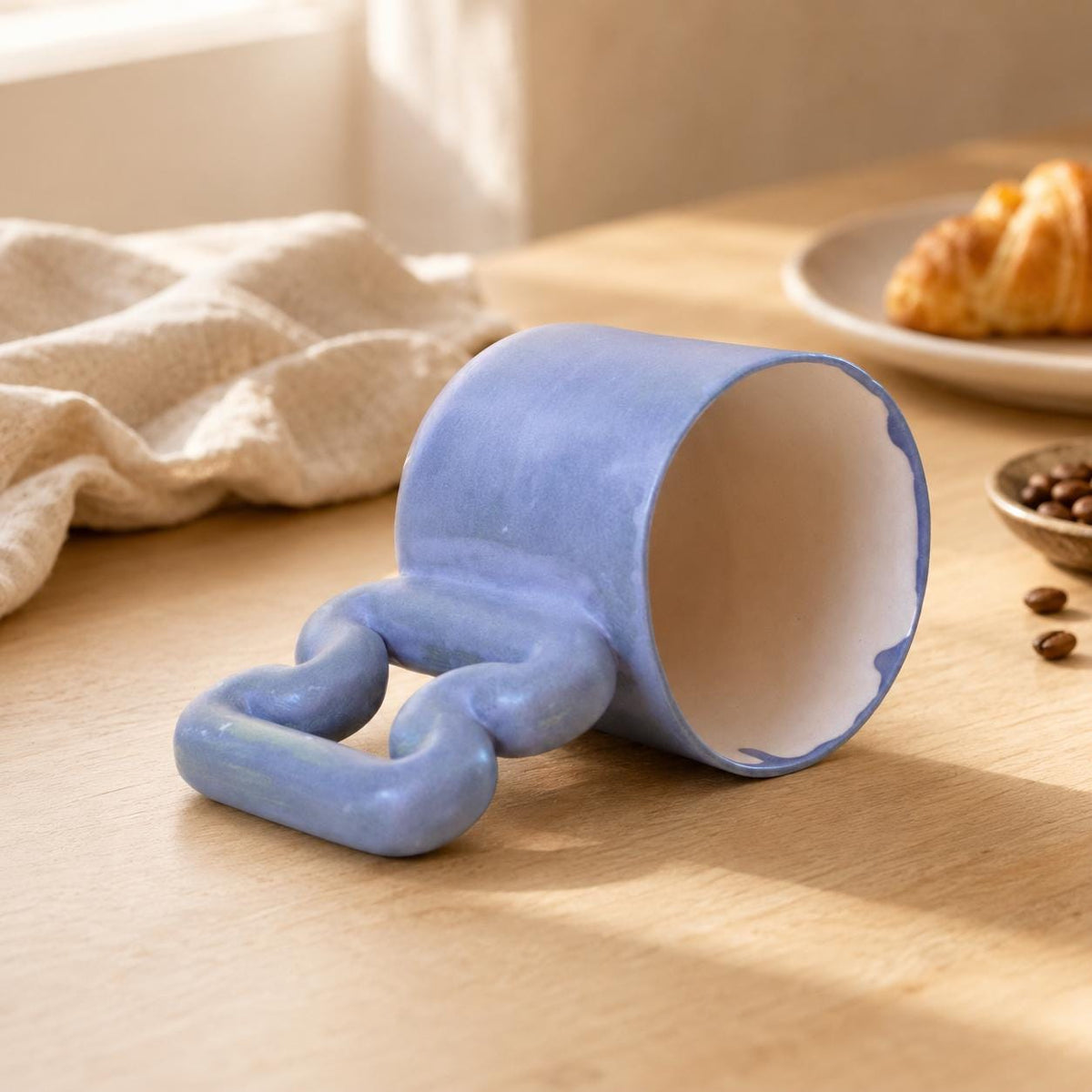 Blue handmade mug on a modern coffee station