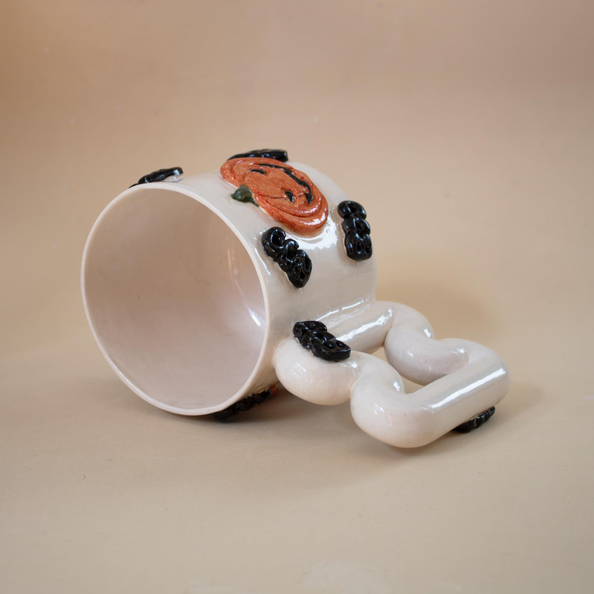 Handmade pumpkin mug, a fun Halloween gift