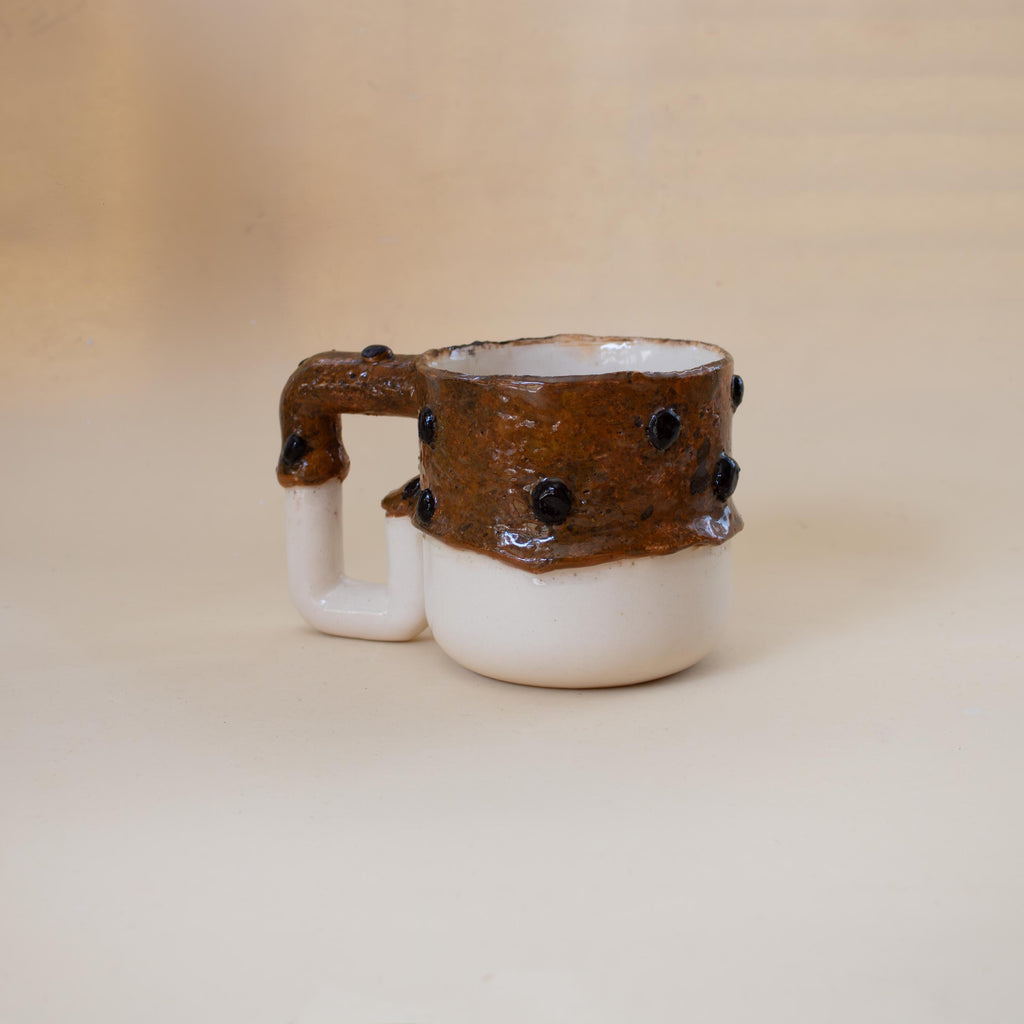 Close-up of chocolate chip texture on porcelain