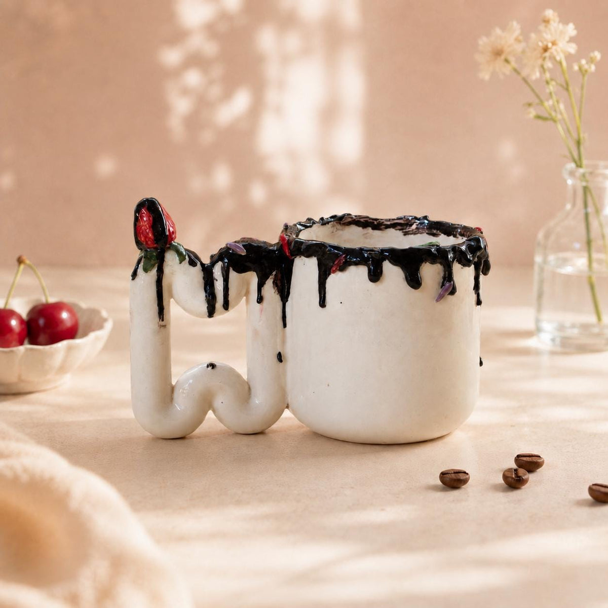 Handmade chocolate drip porcelain mug with red rose handle by HUE Atelier
