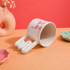 Playful lingerie and laundry line art ceramic cup