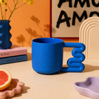 Cobalt blue porcelain mug with squiggle handle by HUE Atelier