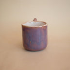 Colour-shifting glaze detail on a handmade mug