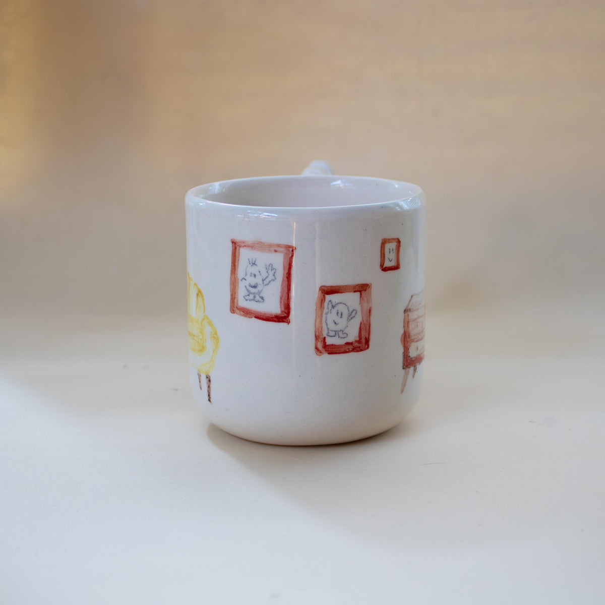 Zigzag handle on a one-of-a-kind illustrated mug