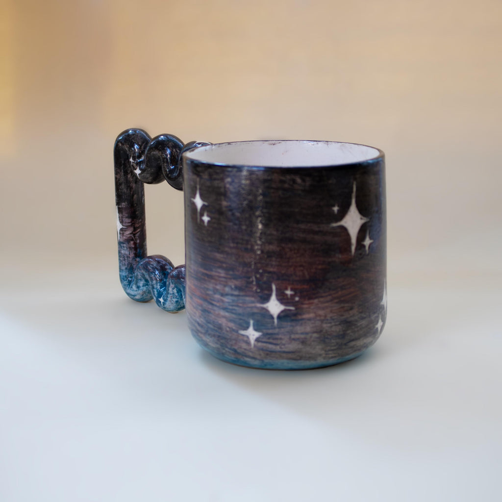 Close-up of hand-painted stars on porcelain