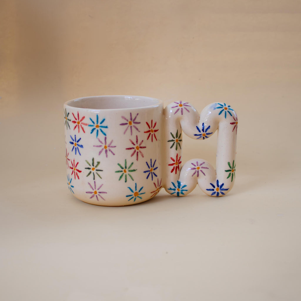 Hand-painted floral porcelain mug with funky handle by HUE Atelier