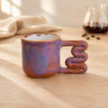 Lavender plum variegated porcelain mug with squiggle handle by HUE Atelier