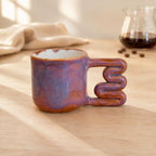 Lavender plum variegated porcelain mug with squiggle handle by HUE Atelier