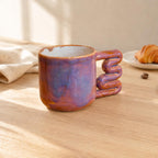 Purple glaze shifting between lavender, plum and amber