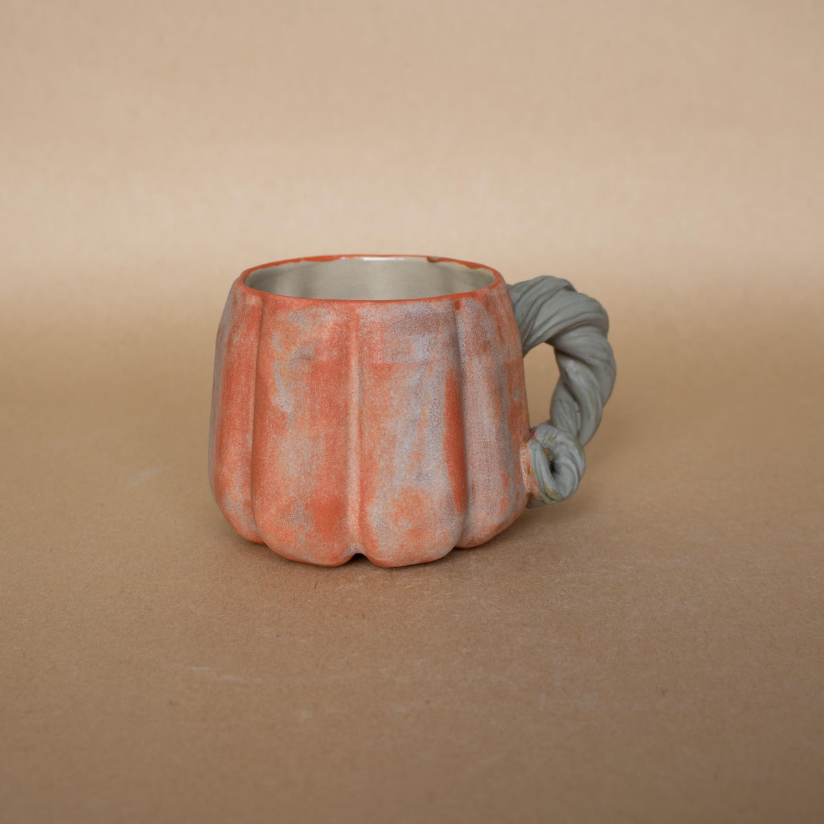 Mini pumpkin stoneware espresso cup with vine handle by HUE Atelier