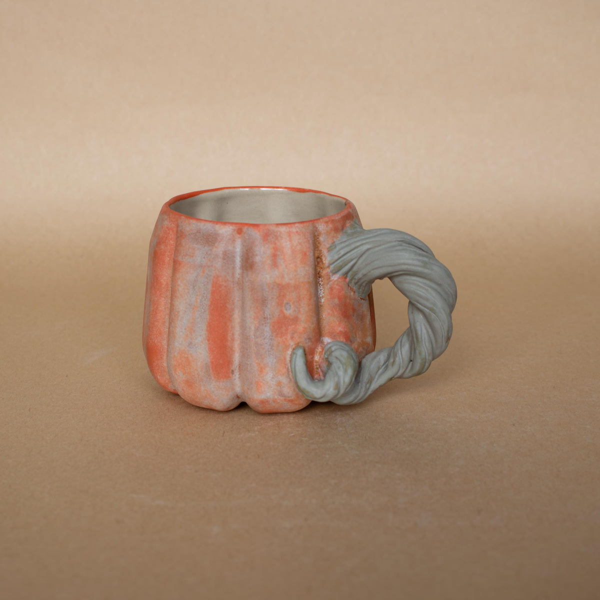 Small matte orange pumpkin cup for espresso and cortado