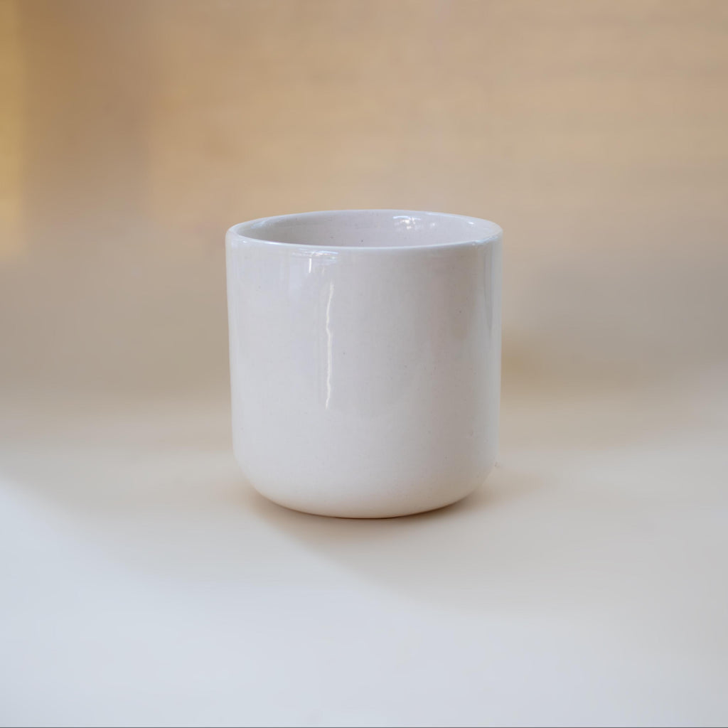 Zigzag handle detail on a minimalist ceramic cup