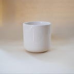 Zigzag handle detail on a minimalist ceramic cup