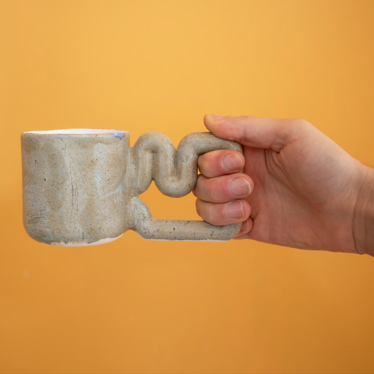 Natural stone speckled porcelain mug with funky handle by HUE Atelier – photo 10