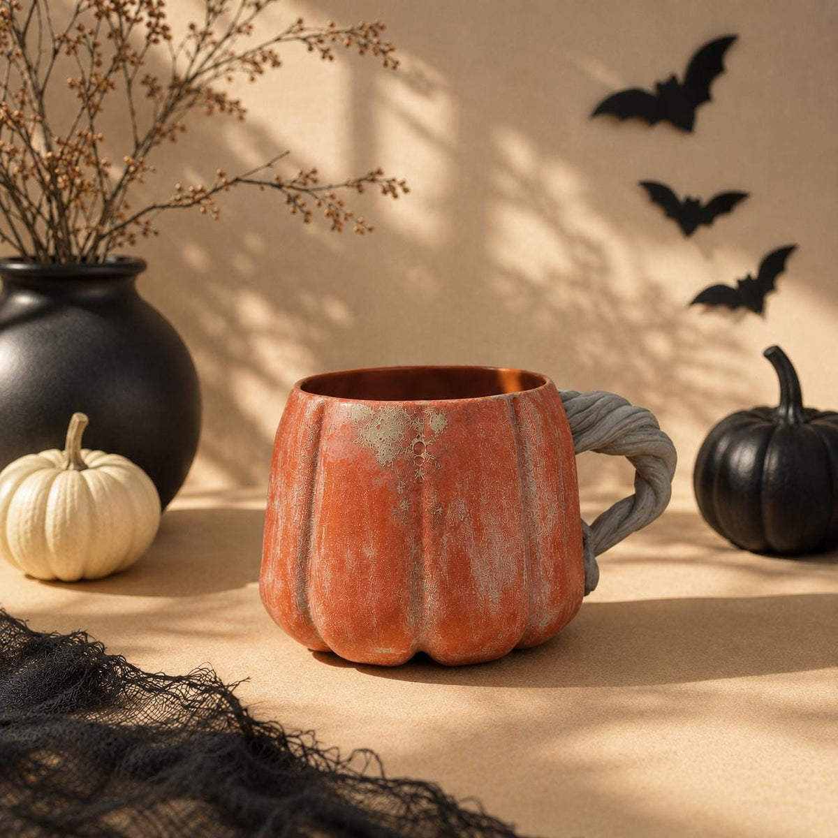 Oversized orange pumpkin stoneware mug with grey vine handle by HUE Atelier