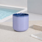 Oversized geometric sculptural handle on a pastel mug