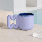 Periwinkle and navy handmade ceramic cup