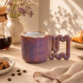Purple glazed porcelain mug with geometric wavy handle by HUE Atelier