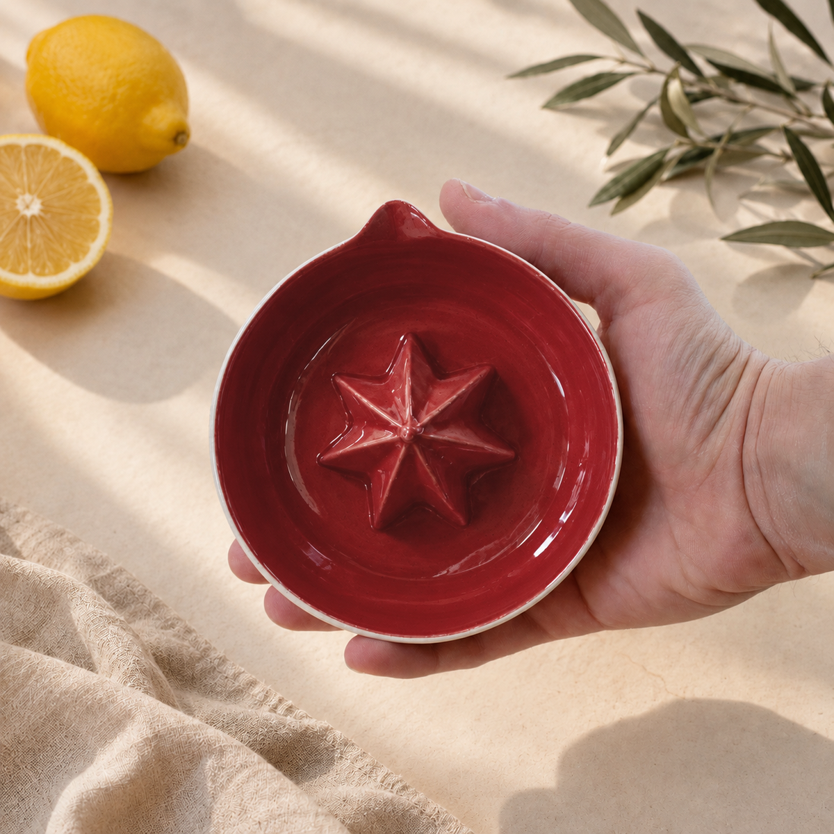 Handmade red citrus press